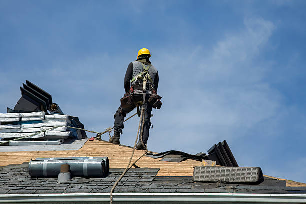 Professional Roofing technician working in Winchester, MA